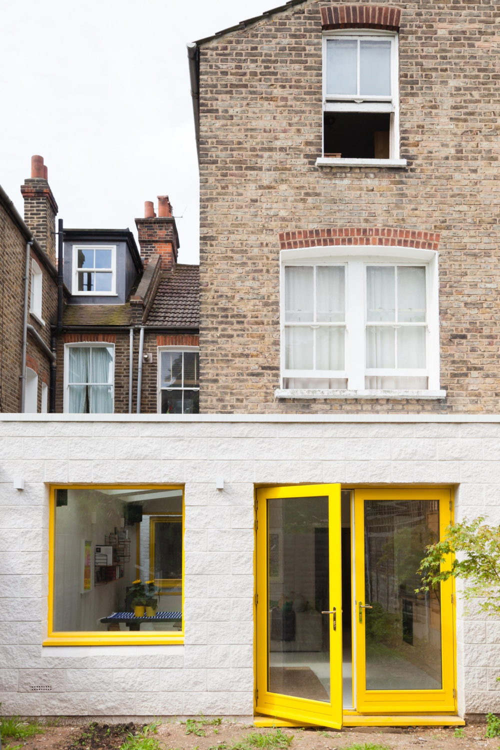 Yellow House | First-Floor Addition by nimtim architects