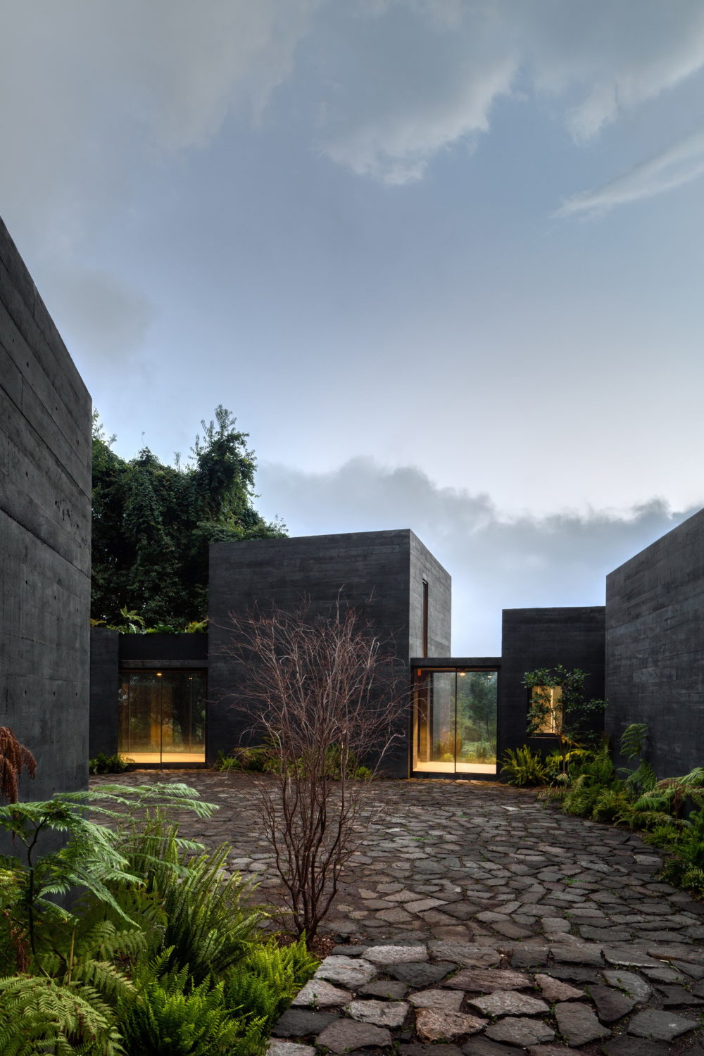 Casa Bruma | Nine Black Concrete Boxes