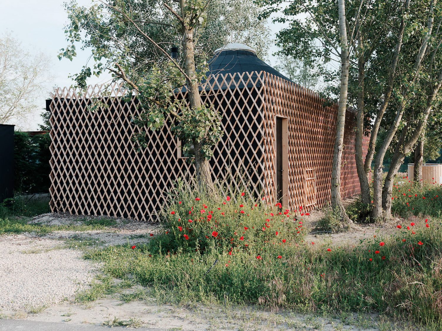 Attila | Oval-Shaped Cottage by JRKVC