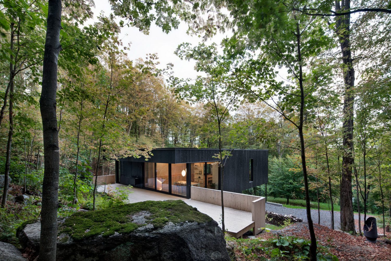 The Rock | Black Residence on a Hillside by Atelier General Architecture