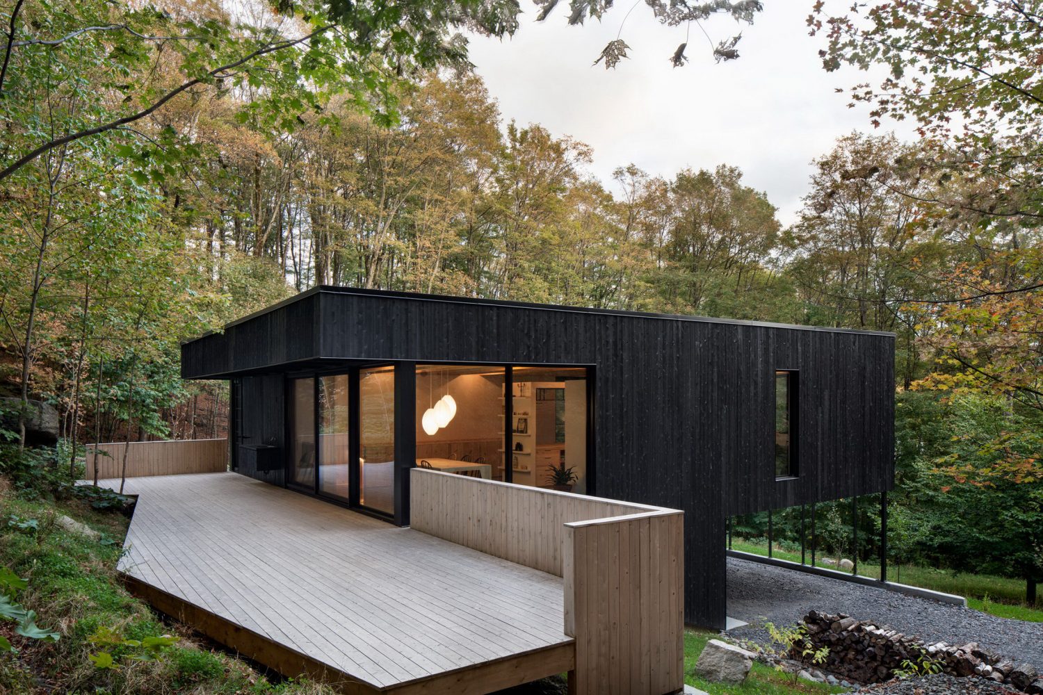 The Rock | Black Residence on a Hillside by Atelier General Architecture
