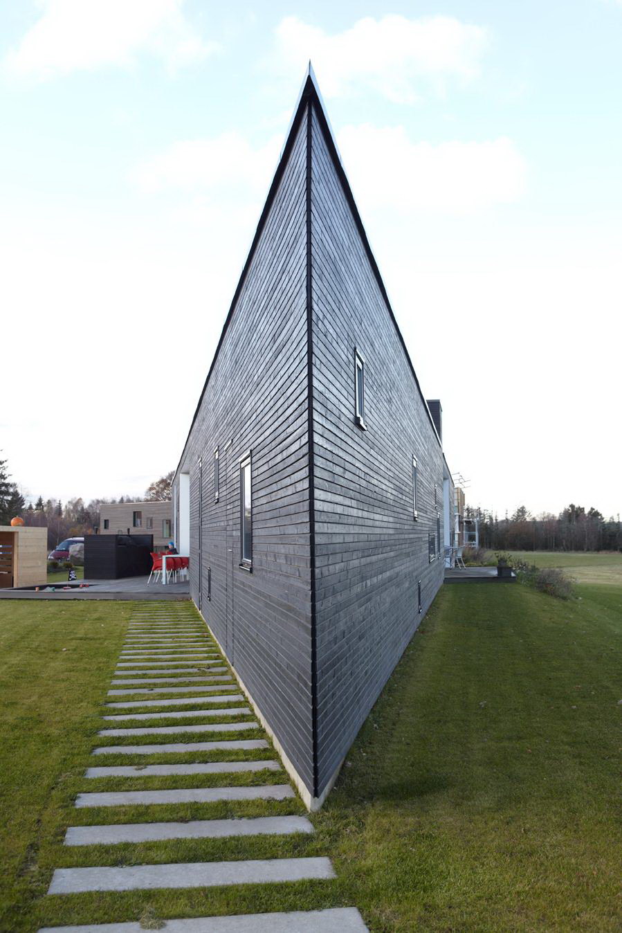 Modern Triangular Home with Black Exterior