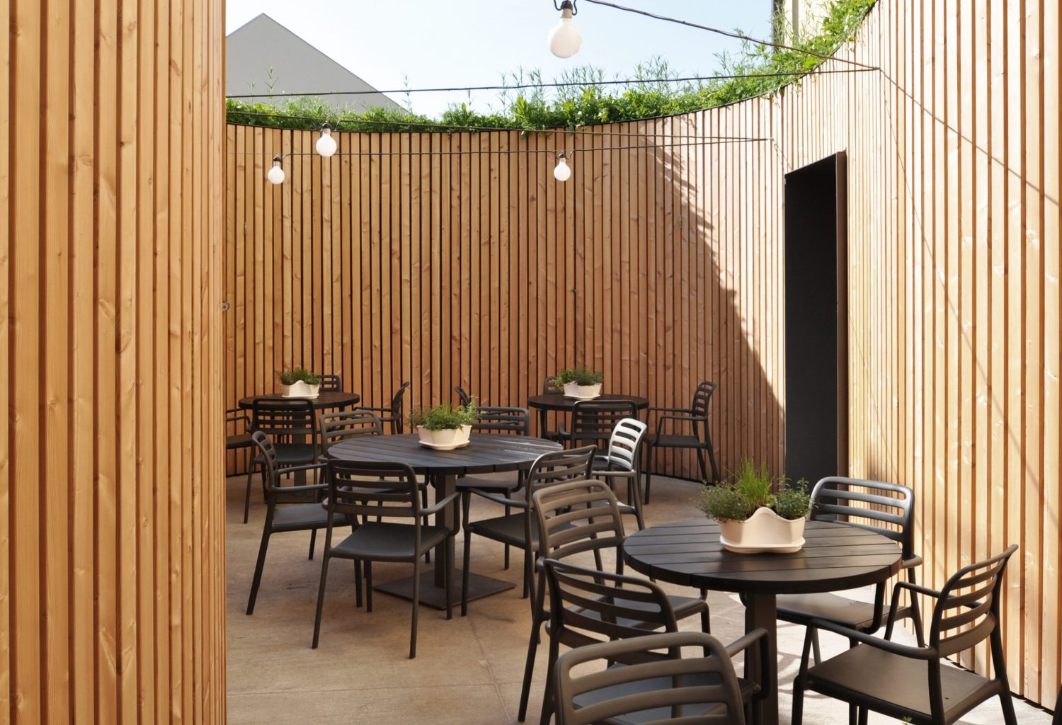 Garden Patio of the Peppino Restaurant by Atelier 111 Architekti