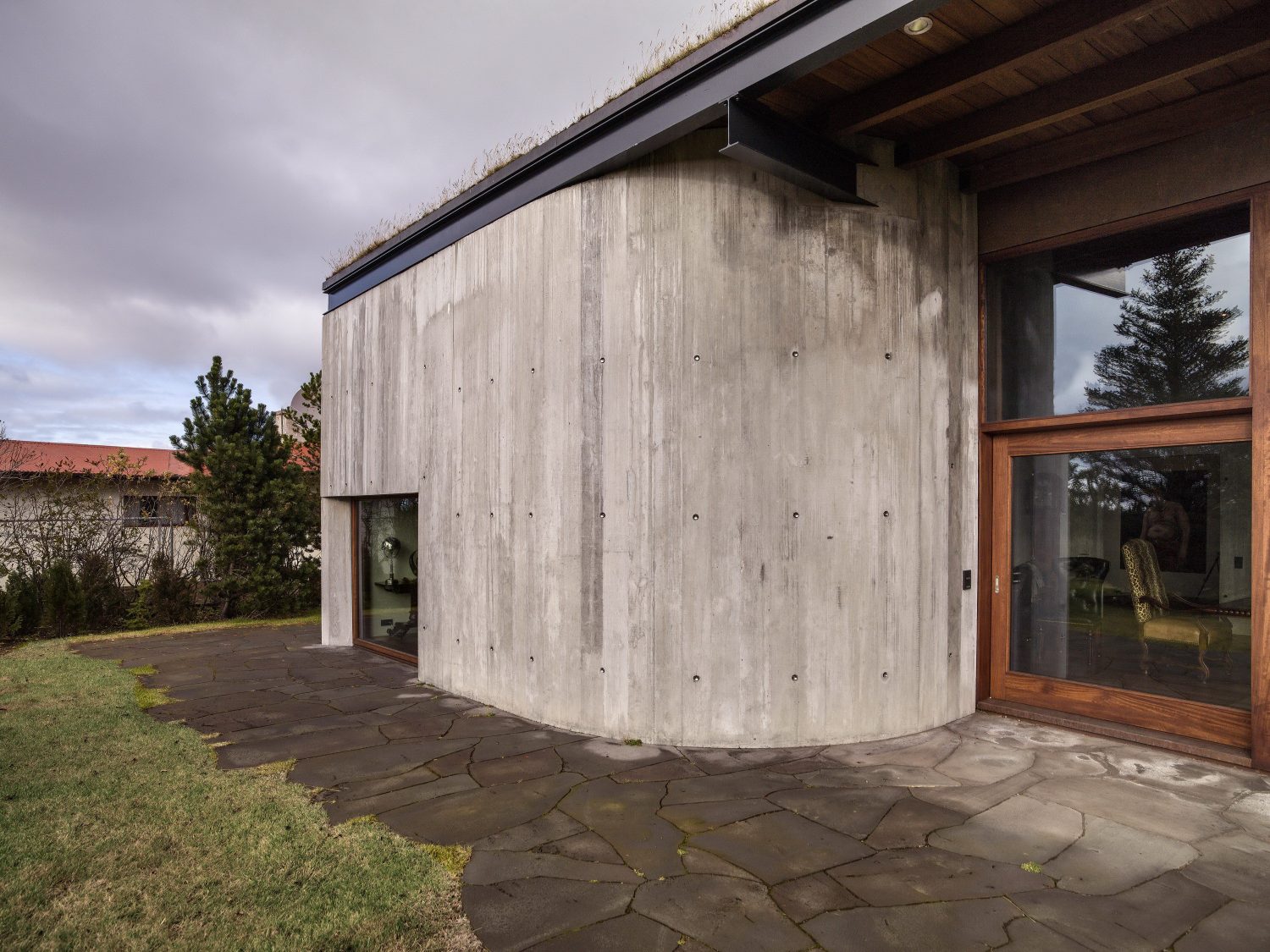 B14 – Icelandic Villa under a Series of Sharply Pitched Green Roofs