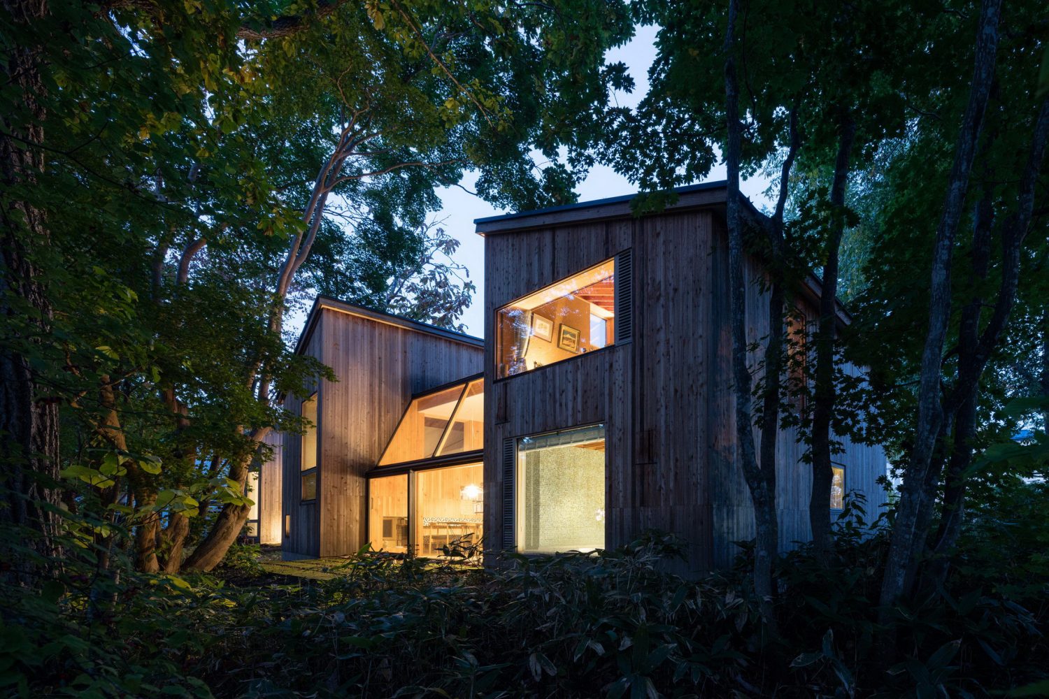 House in Tokiwa – Timber-Clad Cabins by Makoto Suzuki