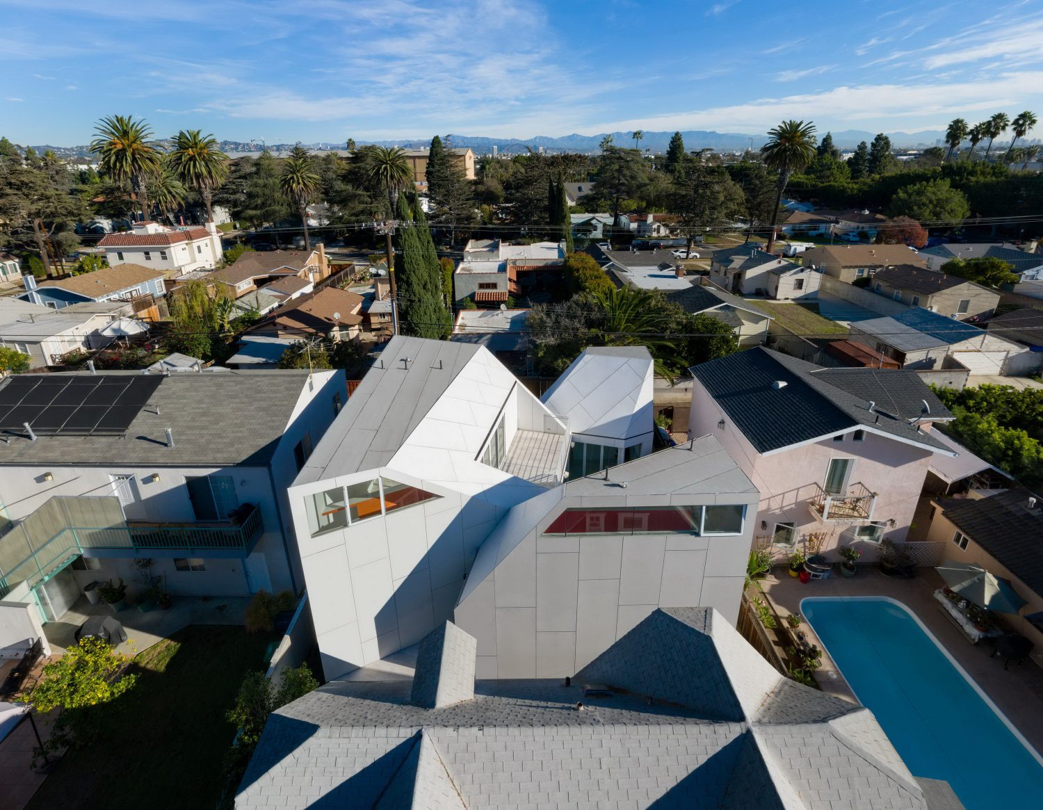 Second House – Home with Steeply Pitched Rooflines by FreelandBuck