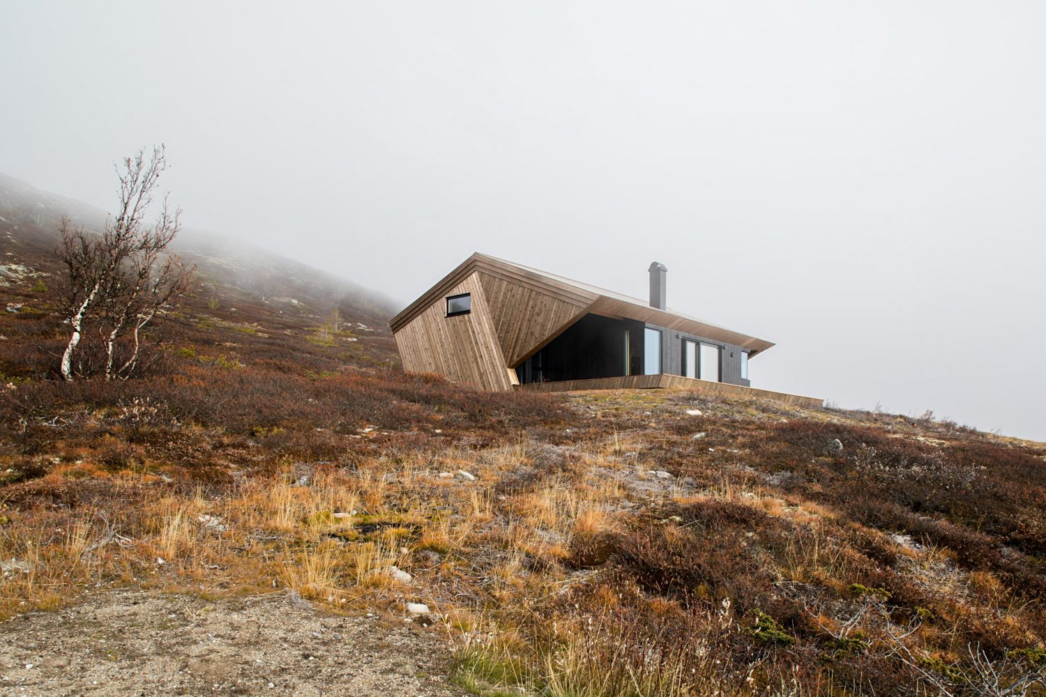 The Hooded Cabin by Arkitektværelset As