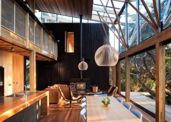 Under Pohutukawa Beach House by Herbst Architects