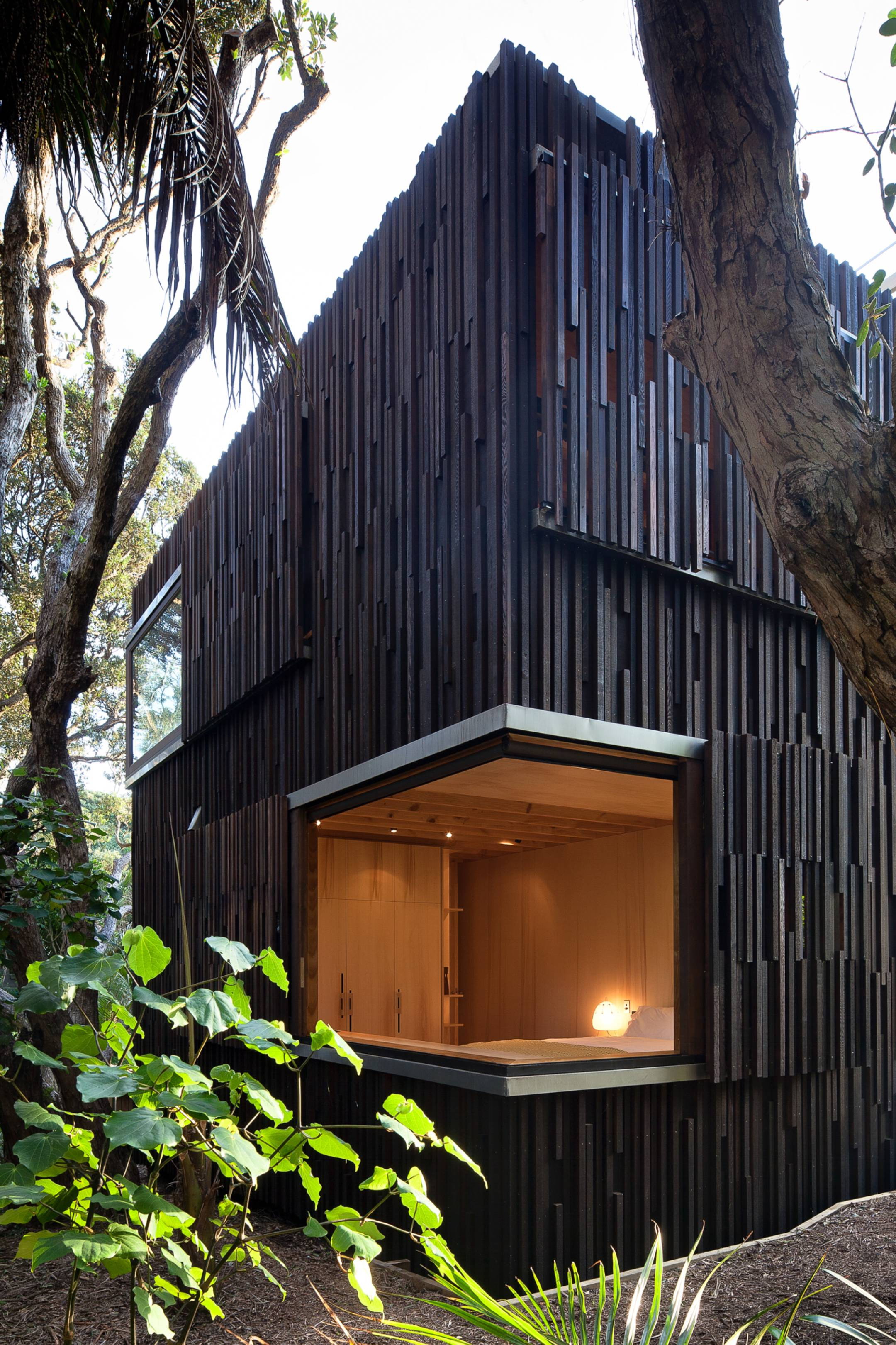Under Pohutukawa Beach House by Herbst Architects