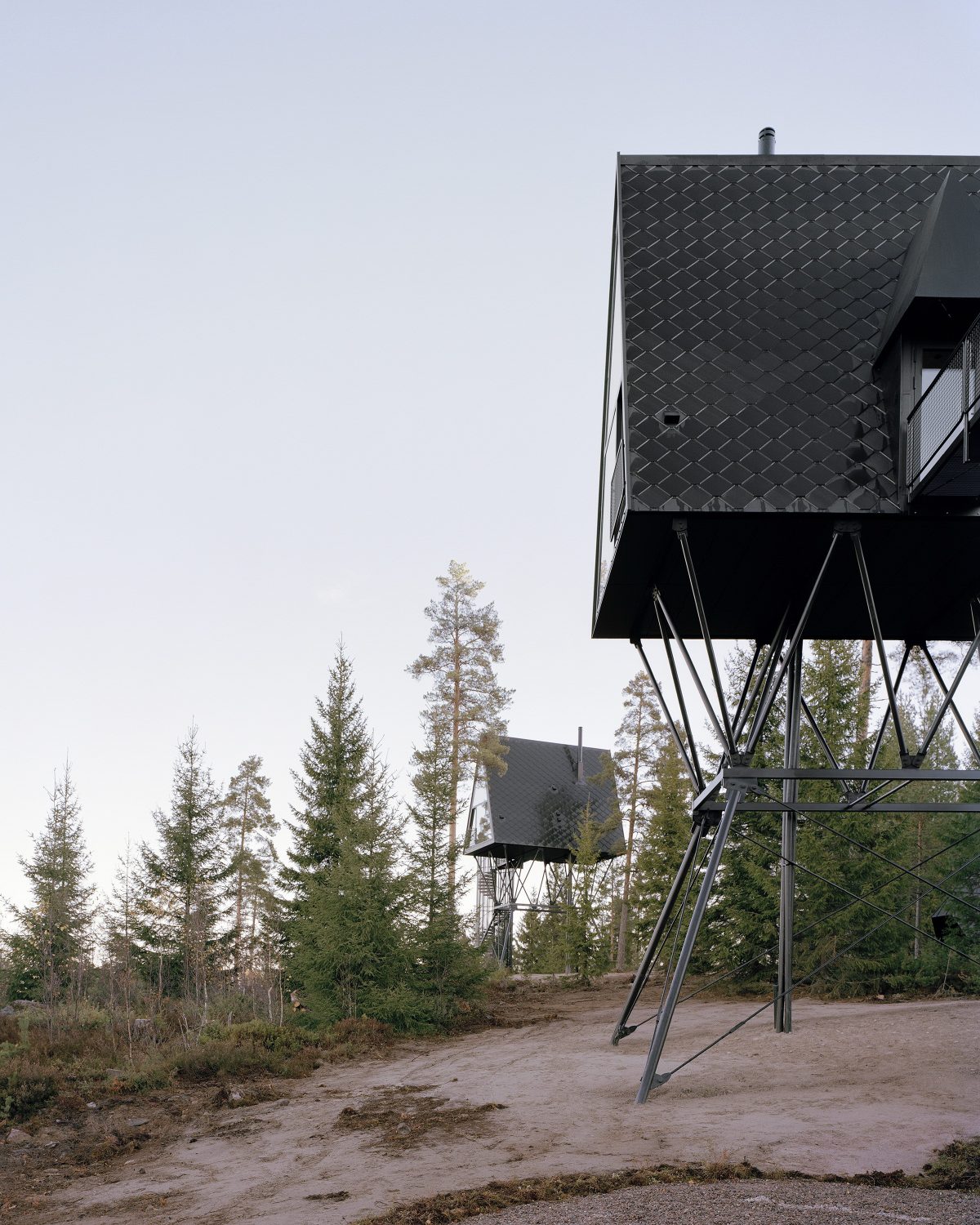 PAN Treetop Cabins | Black A-Frame Cabins by Espen Surnevik