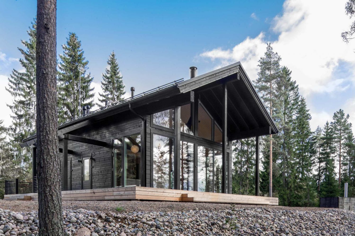 Modern Log Villa in Central Finland by Pluspuu Oy